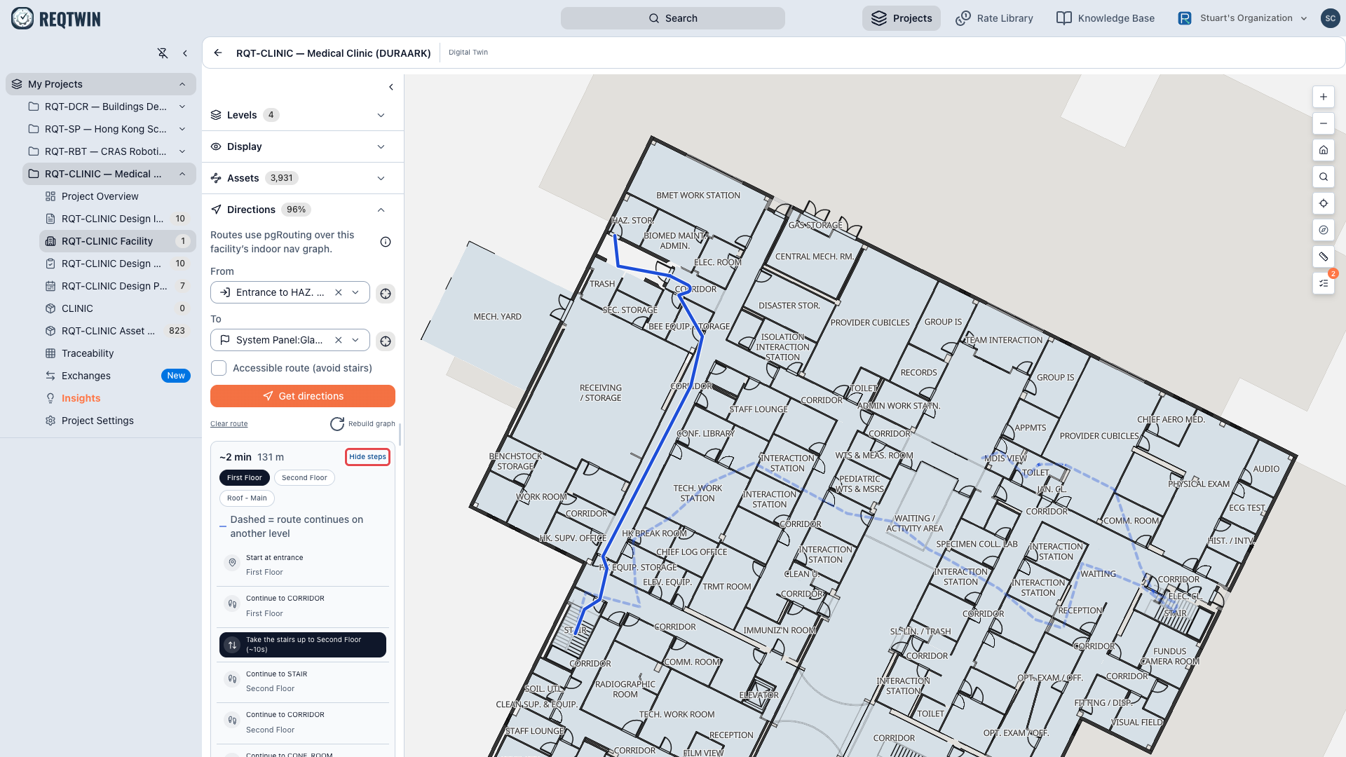 A completed route on RQT-CLINIC: the plan, the Directions panel with From and To set, and the turn-by-turn steps crossing one floor to the next by stair.